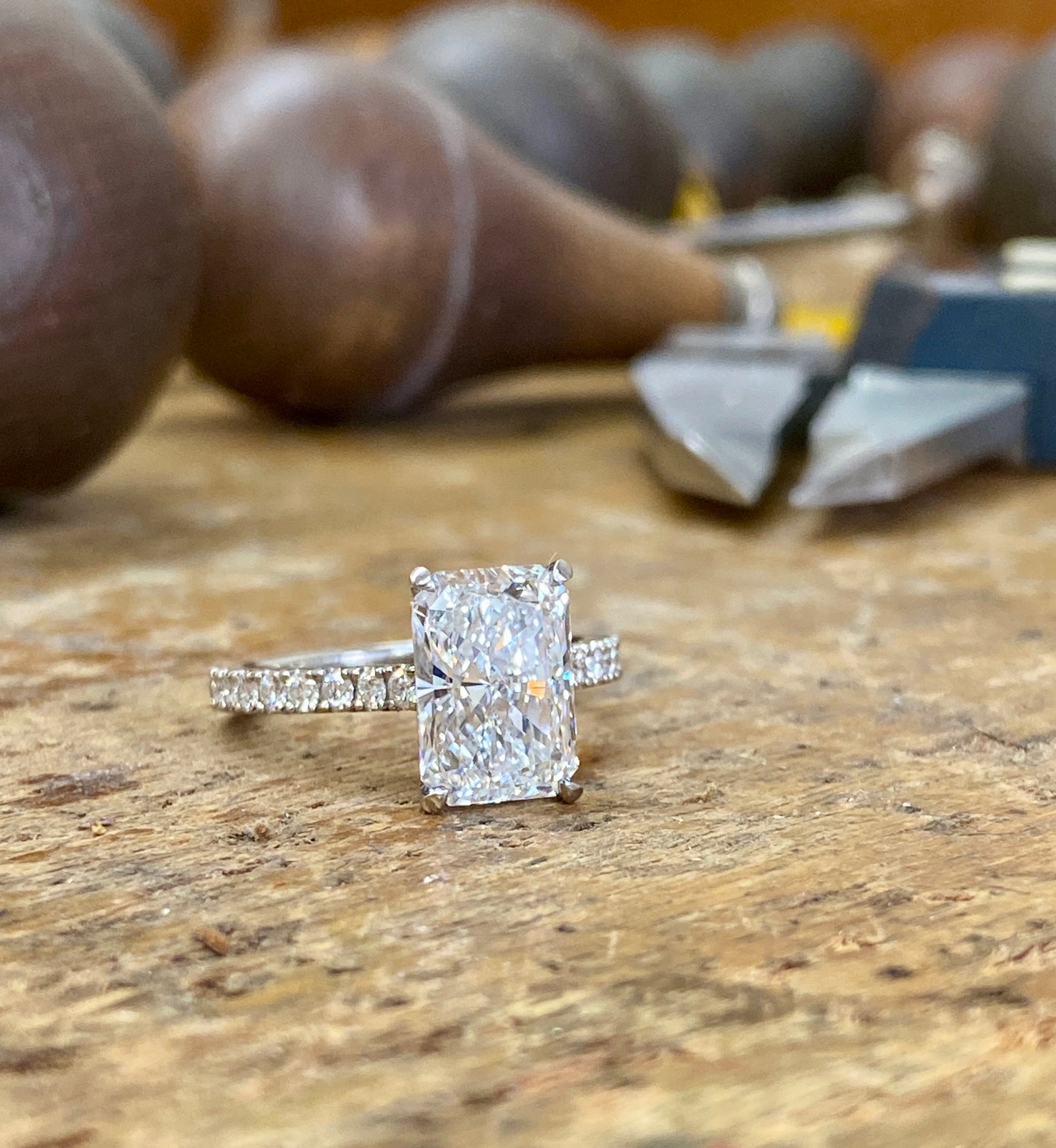 Lab-grown diamond ring with round-cut center stone.