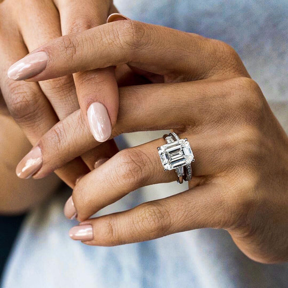 labgrown emerald cut diamond engagement ring on a female hand 